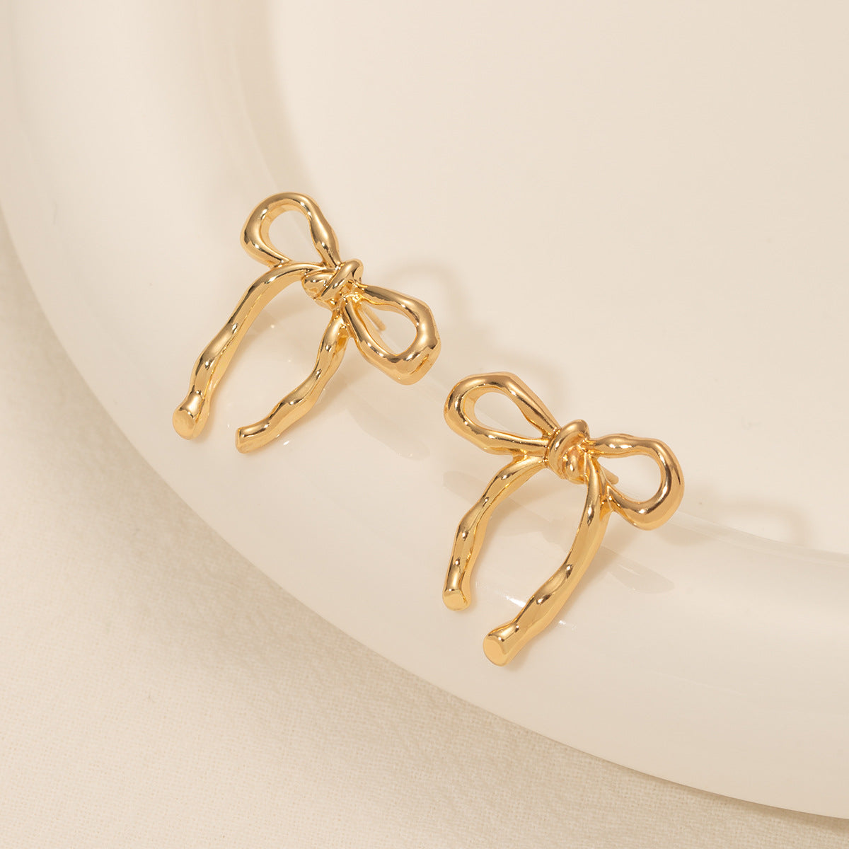 Gold Bow Stud Earrings