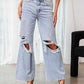 Women's Distressed Slimming Jeans